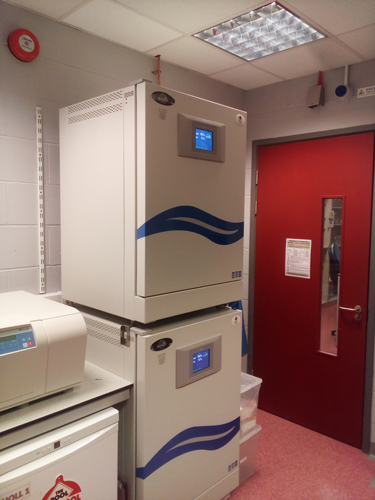 Stacked CO2 incubators in a laboratory. 